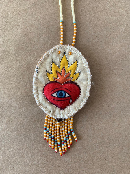 Beaded and quilted handmade necklace.