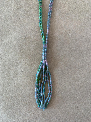 Handmade beaded tassel necklace.