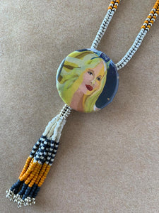 Handmade beaded accessory can be worn multiple ways:  Necklace "chain" with tassel and pin/pendant Necklace "chain" only Necklace with pin/pendant only Pin with tassel on your outfit or bag Pin only on your outfit or bag Tassel and/or pin/pendant on a separate necklace Pin with or without tassel on a hatband!!