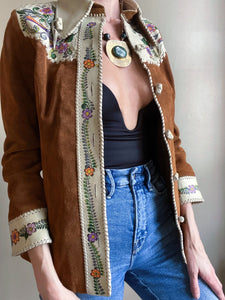 Super rare 70s suede and leather hand painted jacket. Designed by Char. Fits XS best.